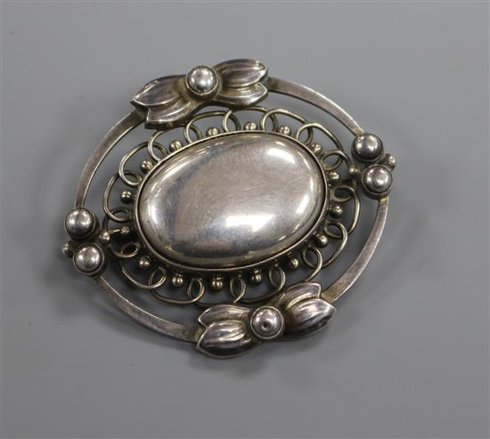 A Danish Georg Jensen sterling silver oval leaf and berry brooch, no. 91, 45mm.